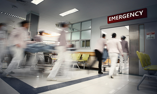 Emergency response team of healthcare professionals hurrying to the emergency room